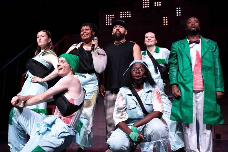 A group of young women performing on a stage