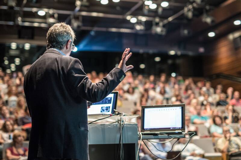 A man delivering a lecture